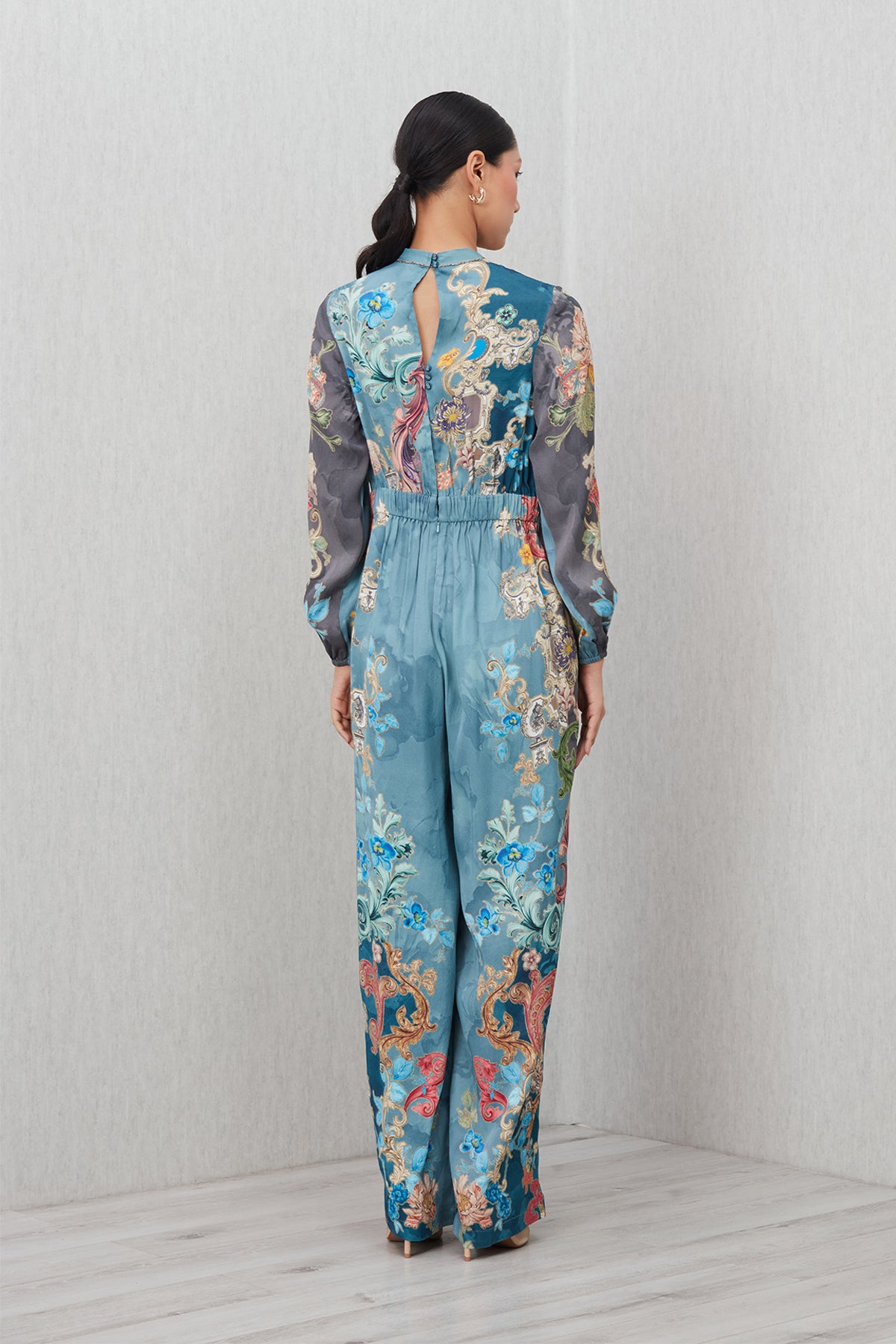 Ranna Gill Aurela Wrap Jumpsuit in Modal Satin Baroque print with wrap silhouette.