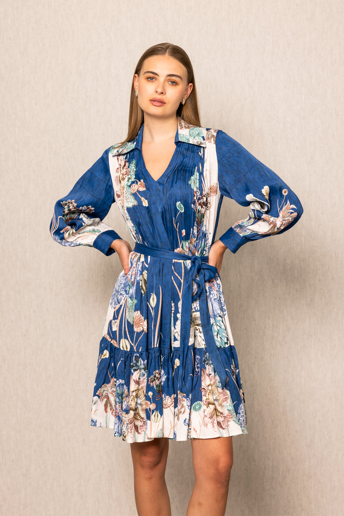 Woman wearing a blue floral dress