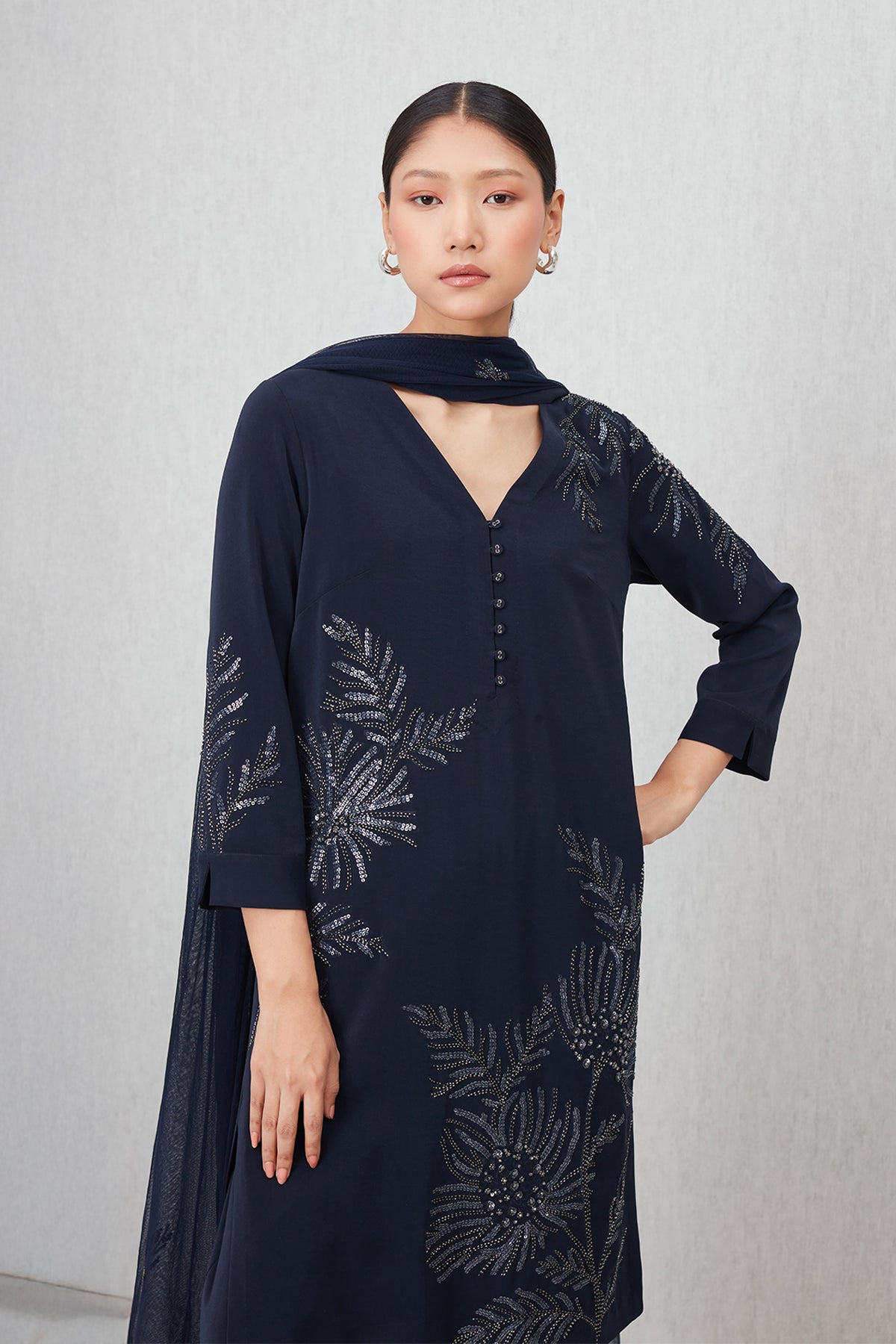 Ranna Gill Tara Tunic Set in navy blue with sequin floral embroidery, featuring a V-neck tunic, straight pants, and matching dupatta.