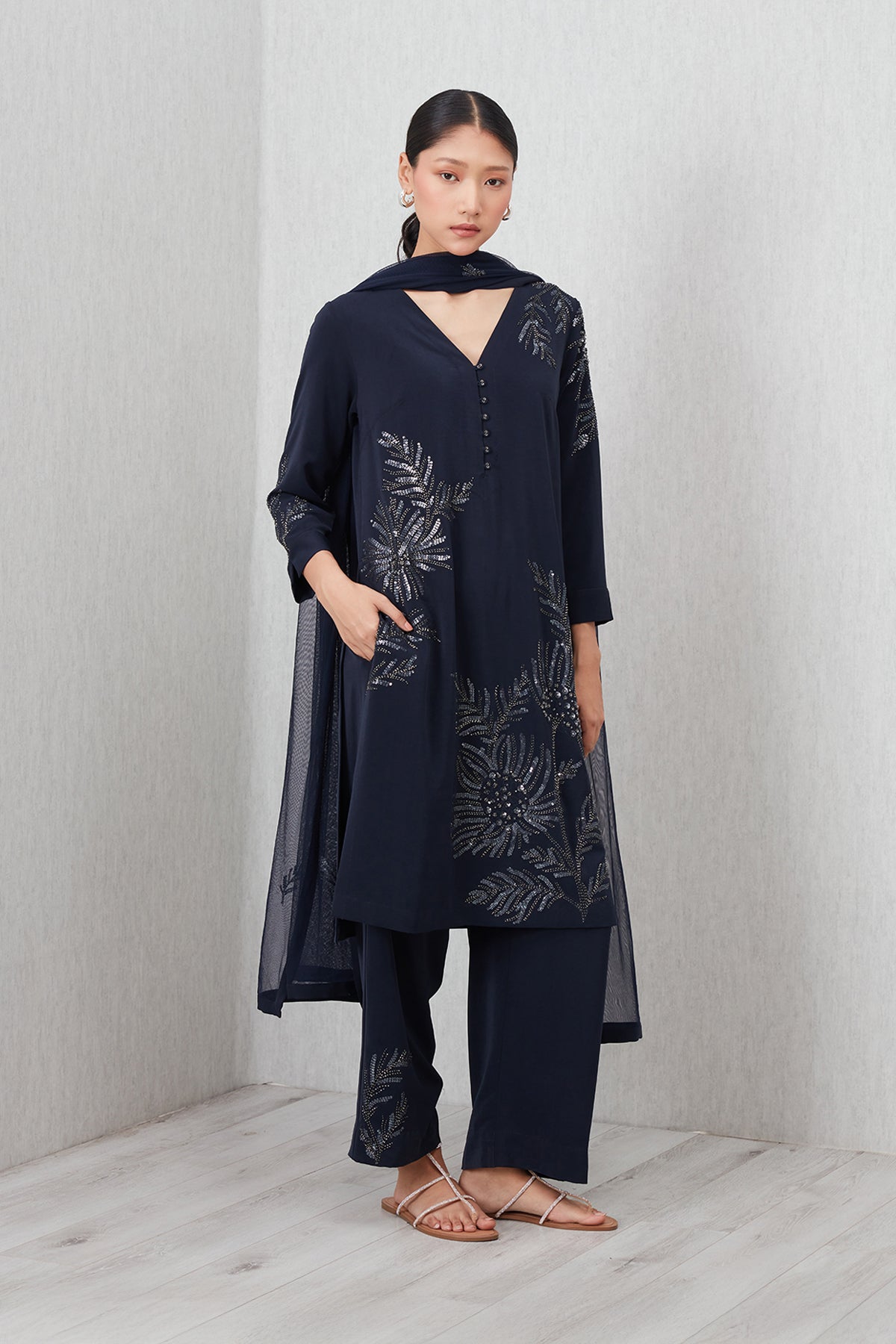 Ranna Gill Tara Tunic Set in navy blue with sequin floral embroidery, featuring a V-neck tunic, straight pants, and matching dupatta.